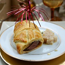 Pavé de boeuf aux 3 poivres en croûte et fondue d’échalotes